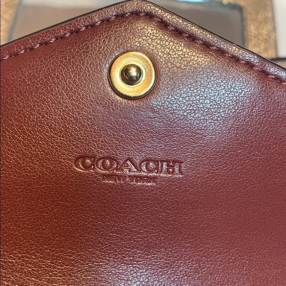 NWT Coach limited edition leashed wallet w/mirror